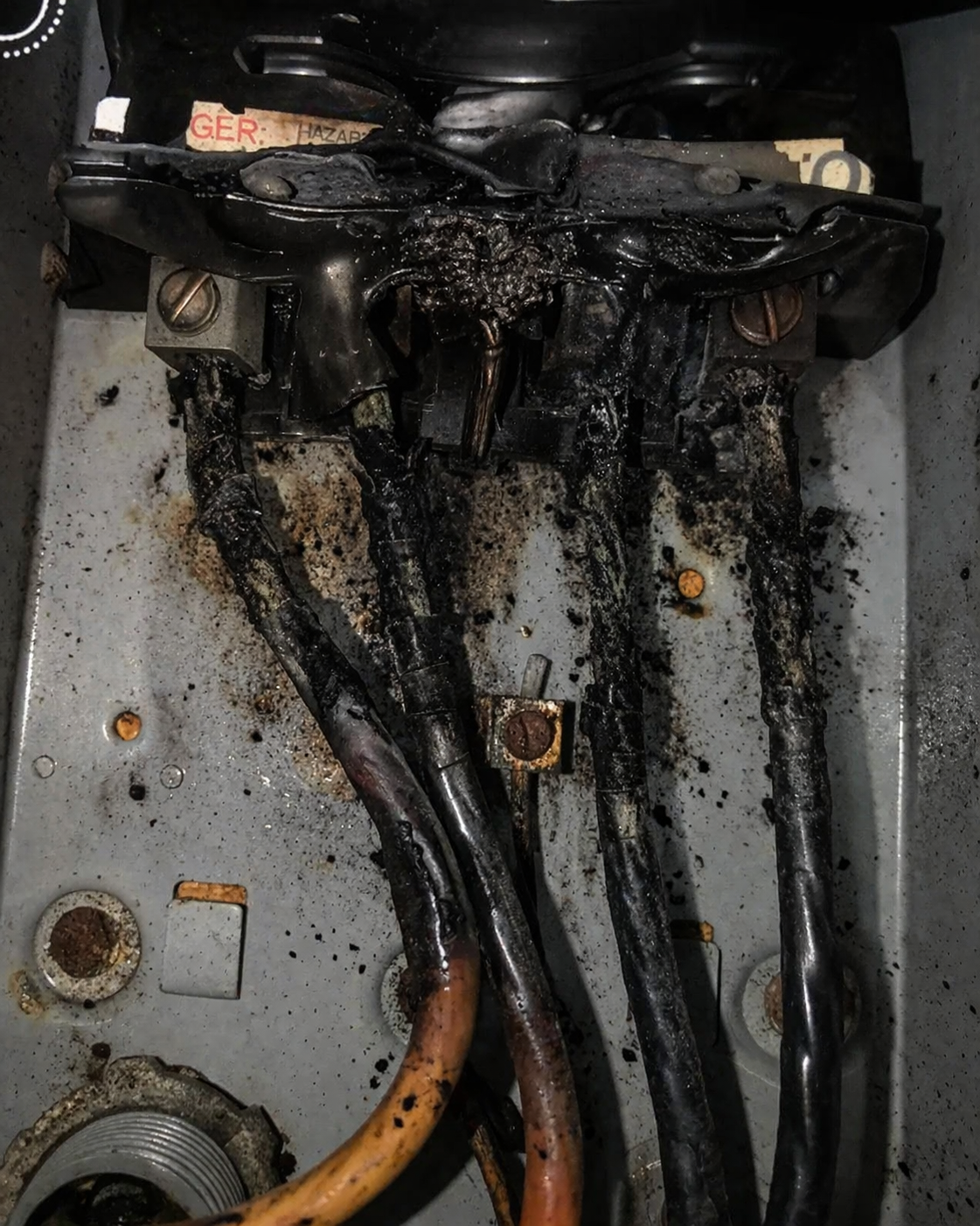 Burnt electrical damage after storm-related power issue
